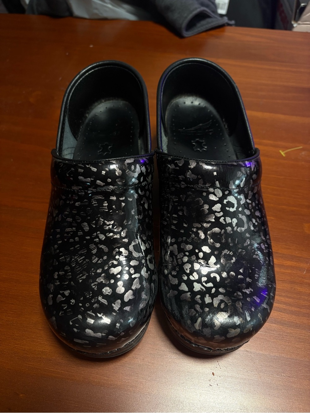Dansko Professional clogs in a Pewter Leopard patent leather finish